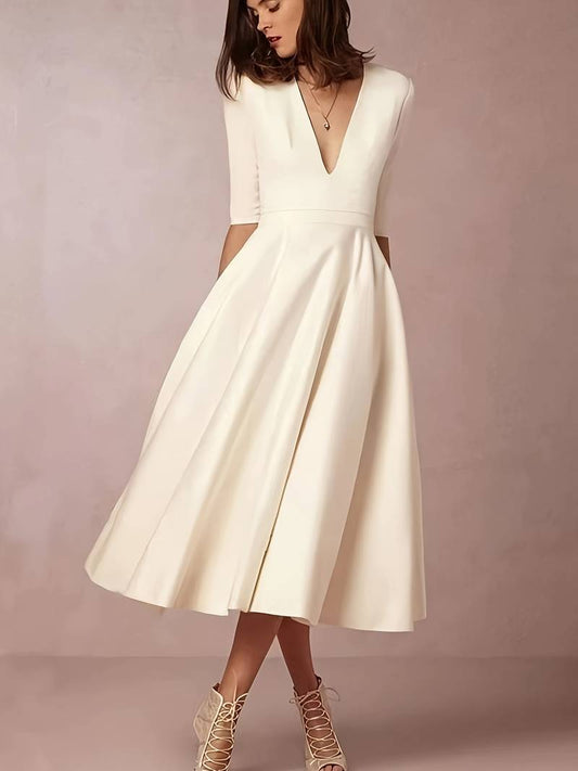 Isabela | Women's midi guest dress with elegant flared skirt