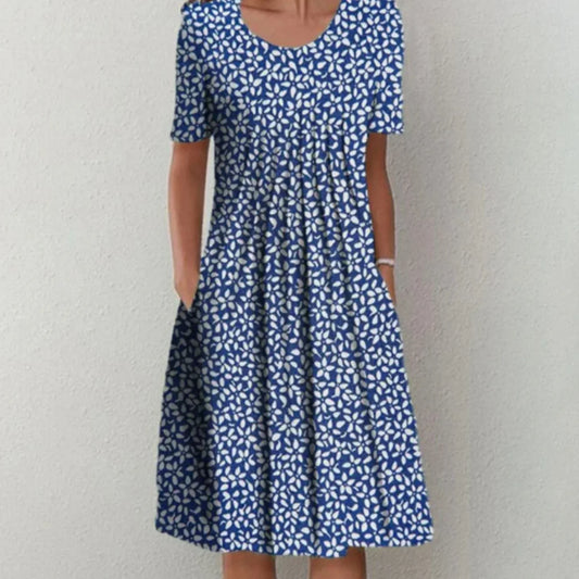 Clara | Femme robe midi florale à manches courtes et poches