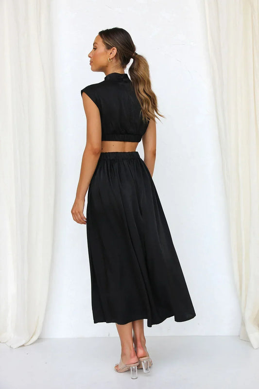 Lucía | Robe midi à découpes, sans manches et col montant