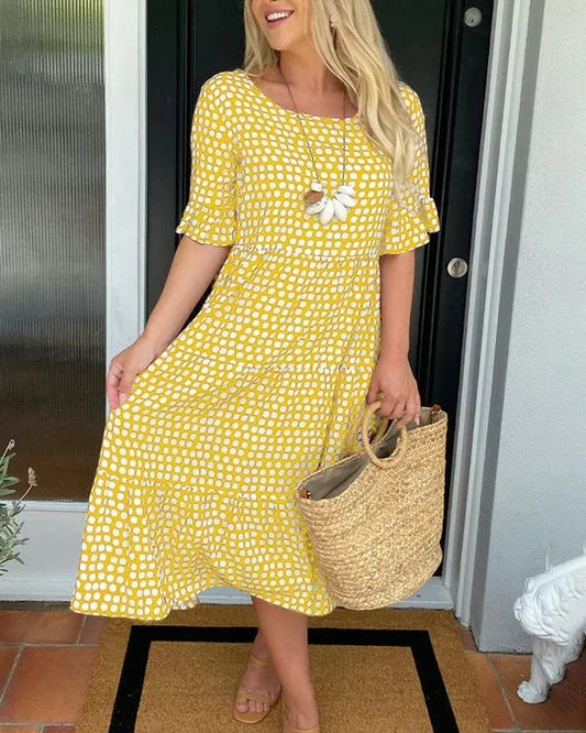 Estrella | Vestido midi relajado con lunares y manga corta