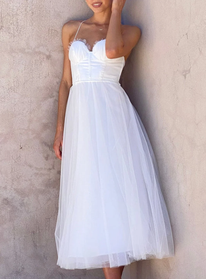 Aitana | Fitted midi dress with thin straps and a flowing skirt