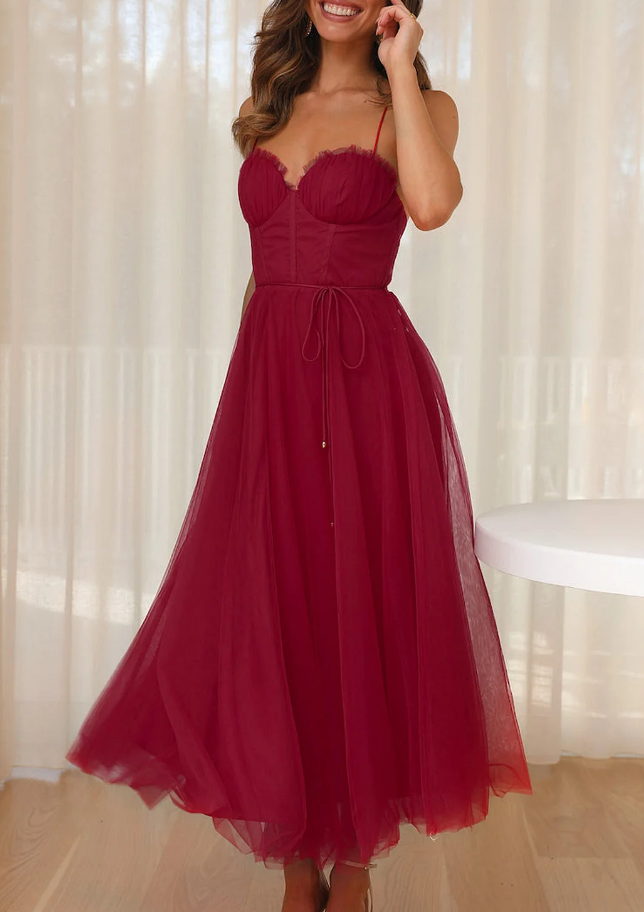 Aitana | Fitted midi dress with thin straps and a flowing skirt
