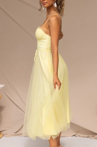 Aitana | Fitted midi dress with thin straps and a flowing skirt