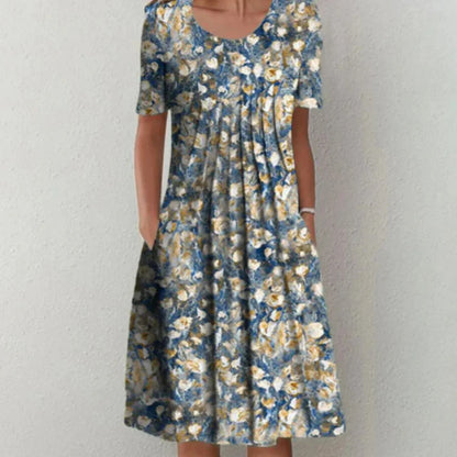 Clara | Woman floral midi dress with short sleeves and pockets