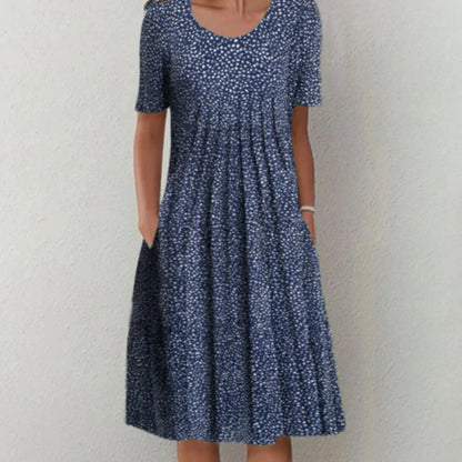 Clara | Woman floral midi dress with short sleeves and pockets