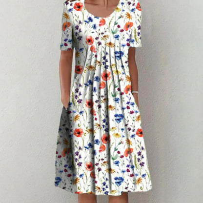 Clara | Woman floral midi dress with short sleeves and pockets