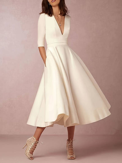 Isabela | Women's midi guest dress with elegant flared skirt
