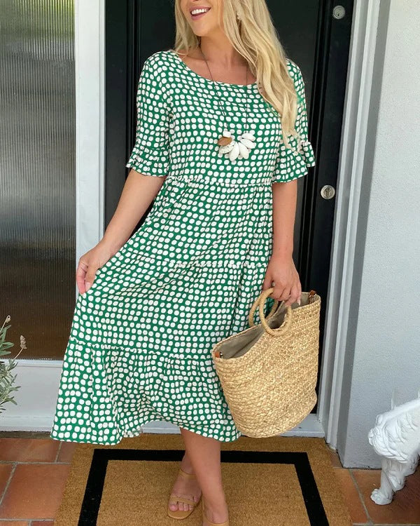 Estrella | Robe midi décontractée à pois avec manches courtes