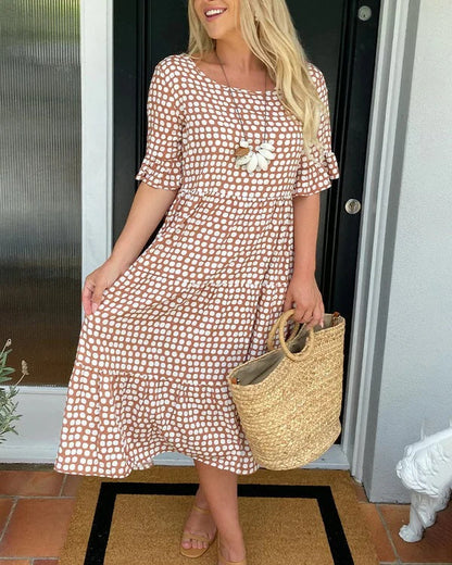 Estrella | Robe midi décontractée à pois avec manches courtes