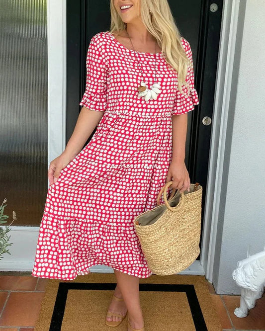 Estrella | Robe midi décontractée à pois avec manches courtes