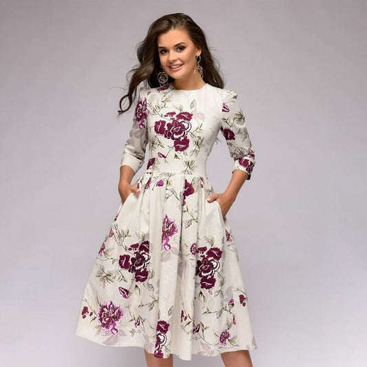 Valeria | Robe midi avec imprimé floral et col rond