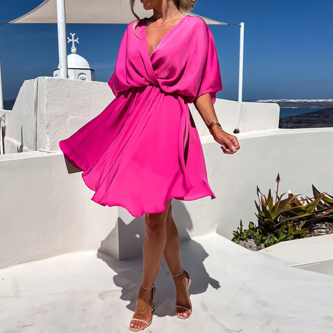 Jana | Elegant women's short dress with a wrap design and fluid drape