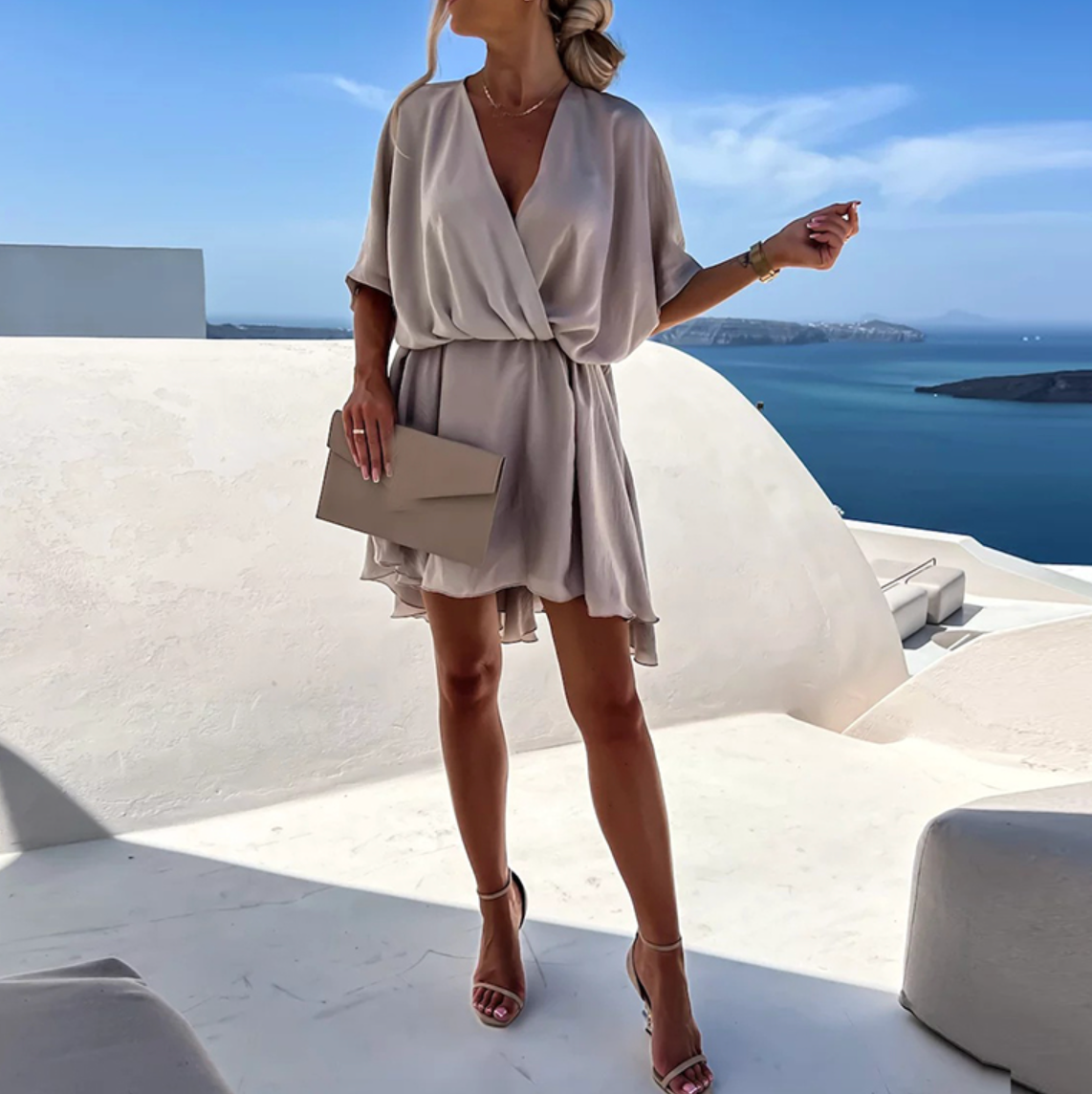 Jana | Elegant women's short dress with a wrap design and fluid drape