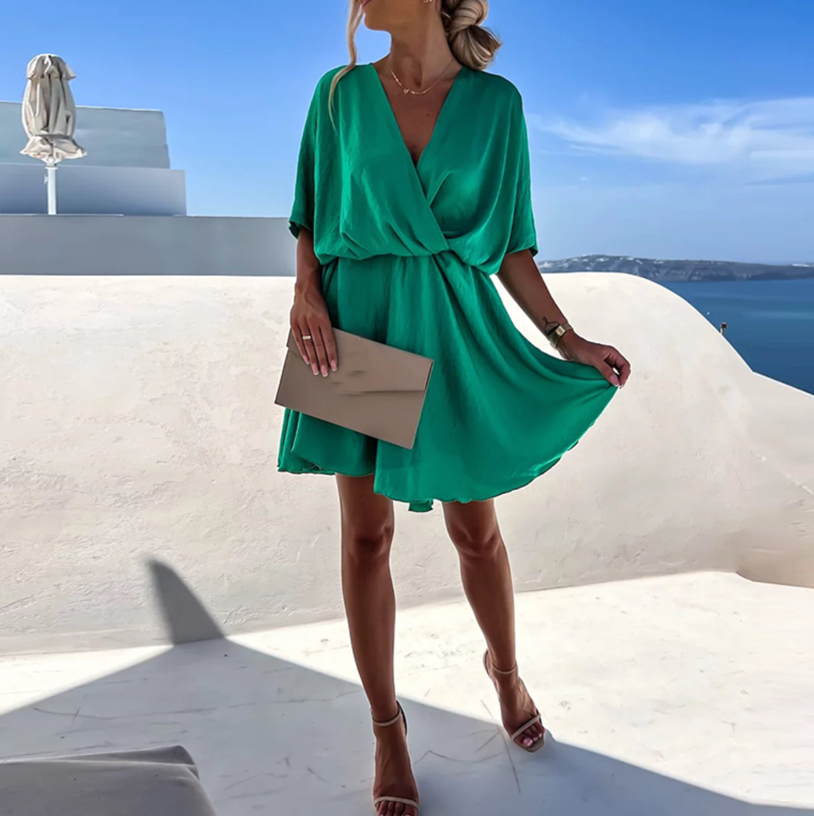 Jana | Elegant women's short dress with a wrap design and fluid drape