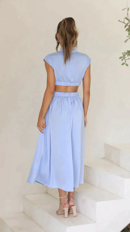 Lucía | Vestido midi con corte cut out y diseño sin mangas cuello alto